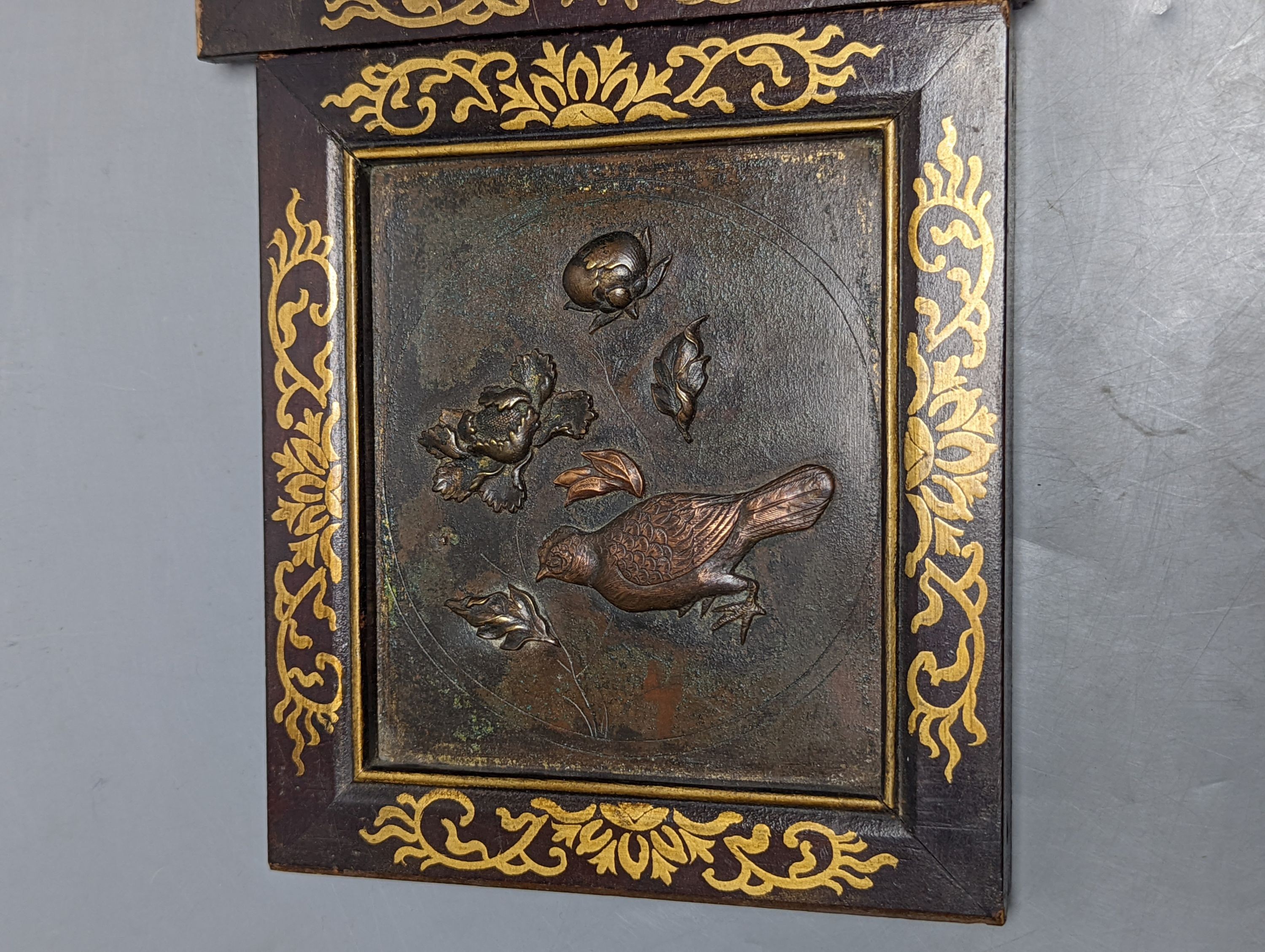 A pair of Japanese mixed metal chicken panels, in gilded wood frames, 17cm. high